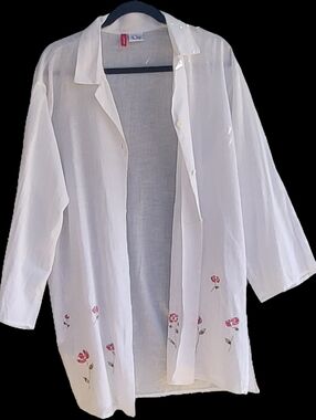 Lightweight White Long Sleeve Button-Down Cove Up with Red Floral Embroidery.
